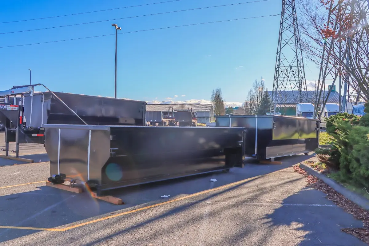 Roll-off dumpster ready for waste disposal at job site for 12 Yard Dumpster Rental in Monitor